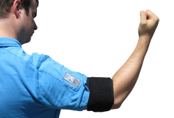 A Person Wearing a King Brand Wrist ColdCure Wrap to Treat Lower Bicep Tendonitis