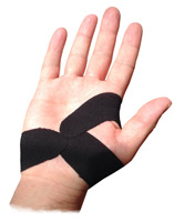 A hand that has been taped to supprt the area surrounding a Carpal Tunnel injury, to provide support and prevent re-injury